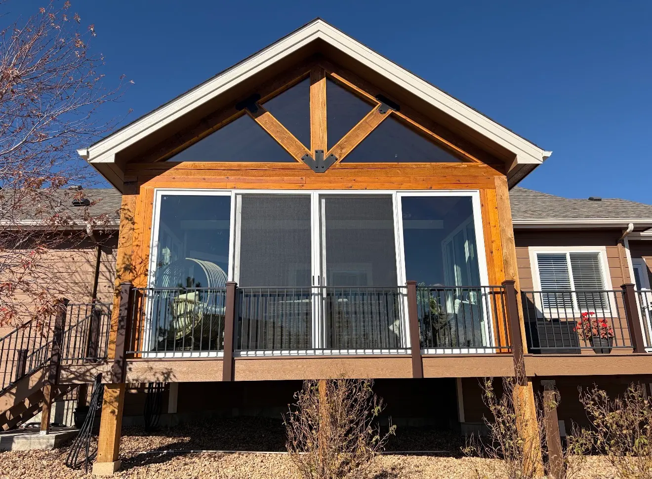 Front exterior view of elevated gable sunroom in Elizabeth, Colorado