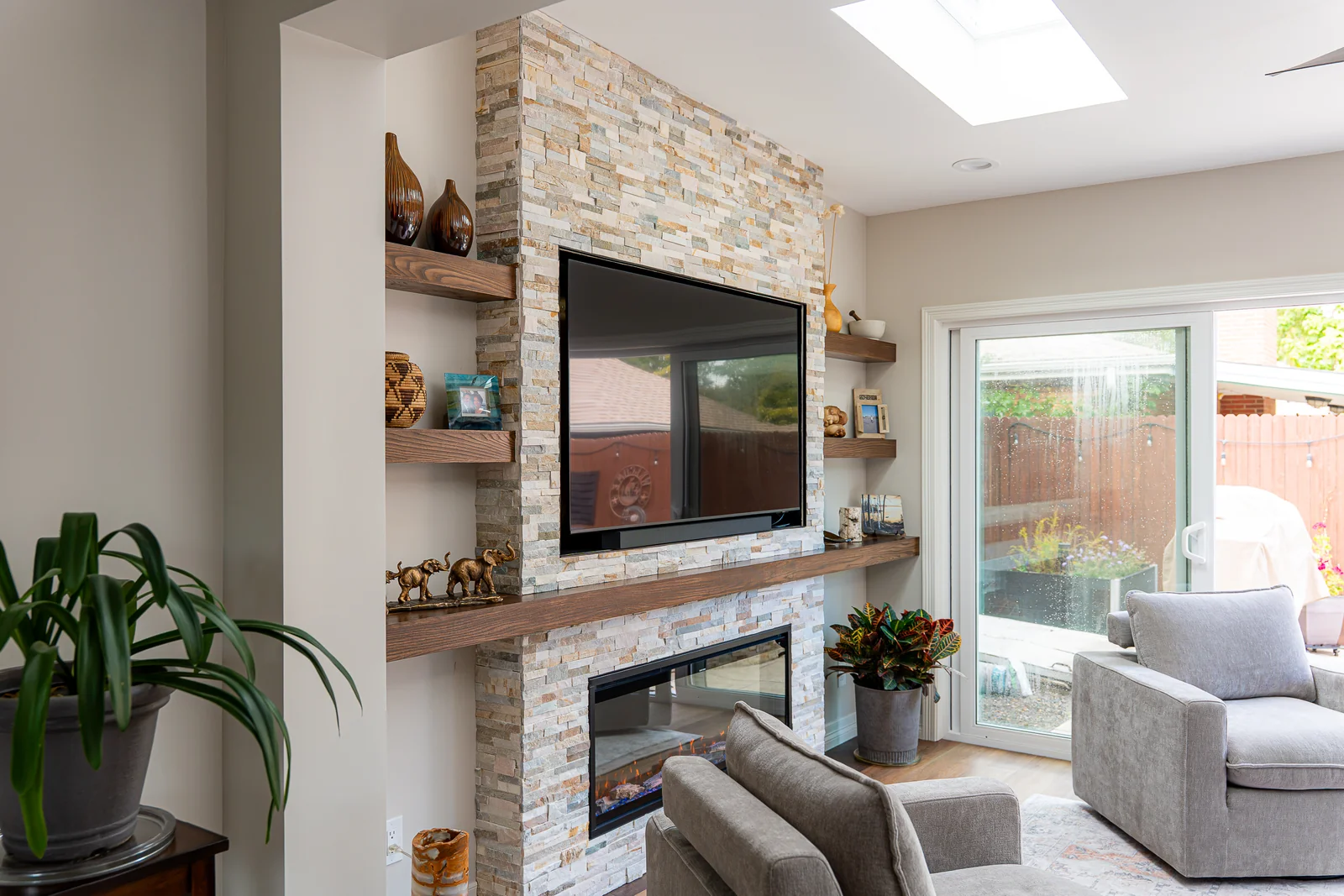 Skylight and raised ceiling above the sunroom fireplace area