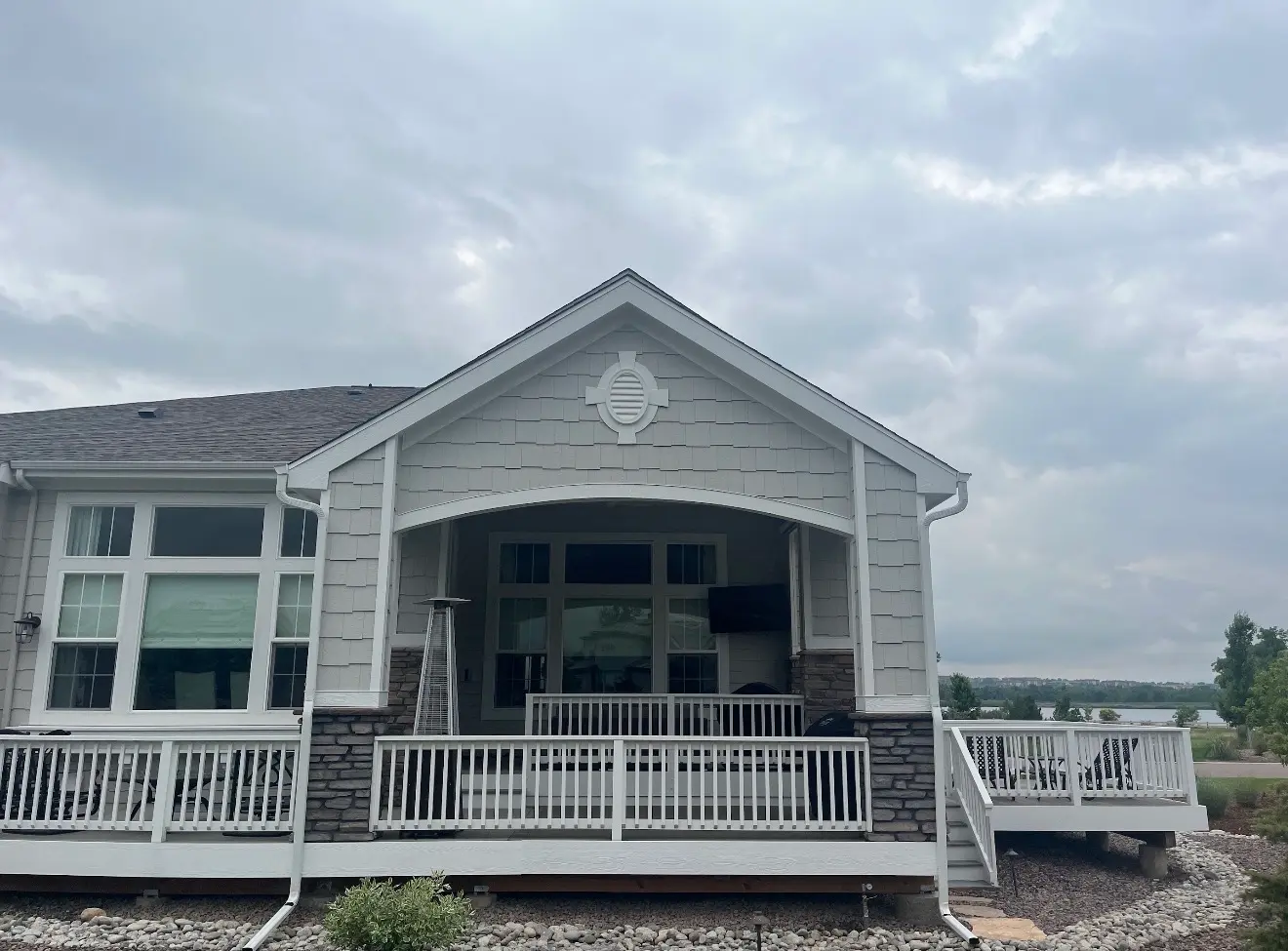 Front view of covered deck matching house design in Columbine Valley, Colorado