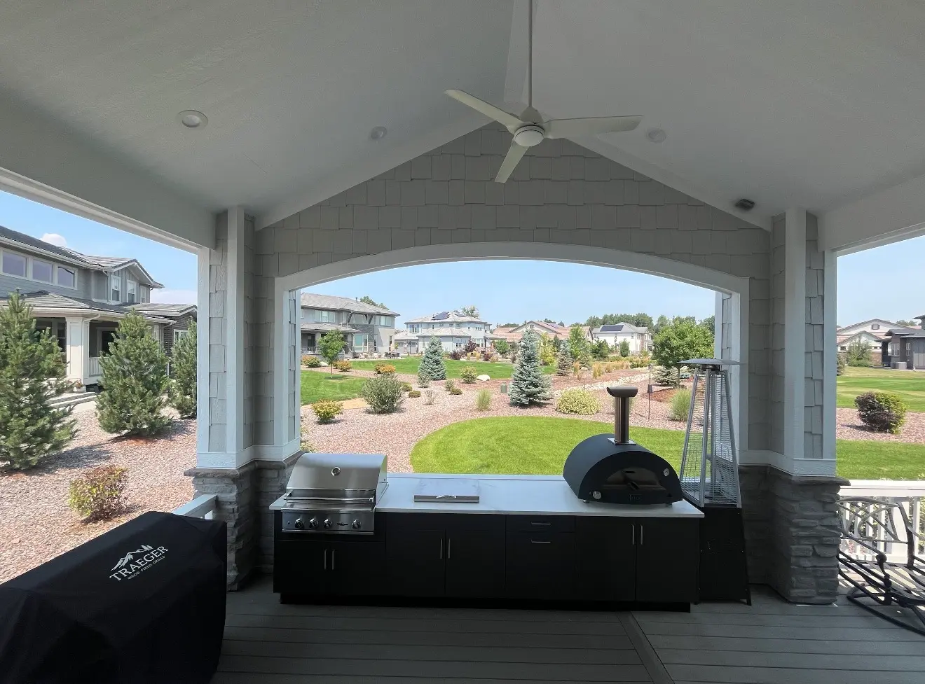 Covered outdoor kitchen area under roof cover in Columbine Valley, Colorado
