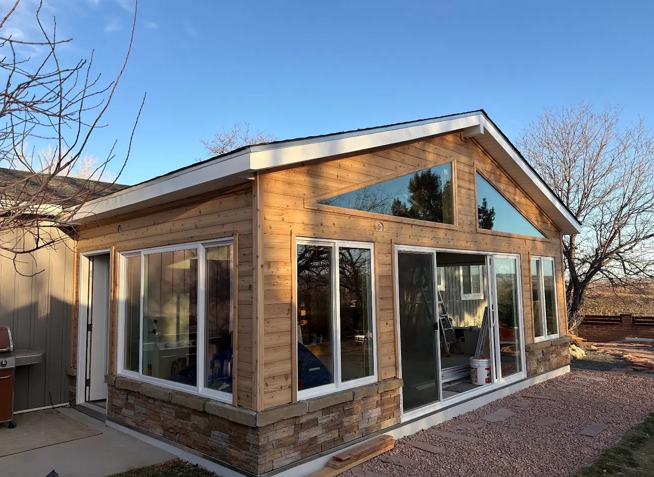 Side exterior view of completed custom sunroom in Boulder, Colorado
