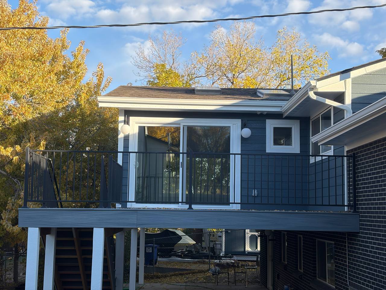 Elevated sunroom enclosure and deck in Centennial CO