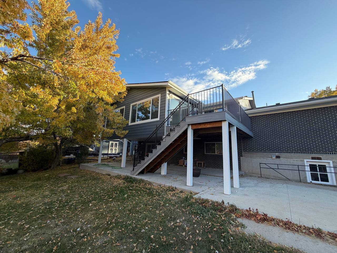 Elevated sunroom enclosure and deck in Centennial