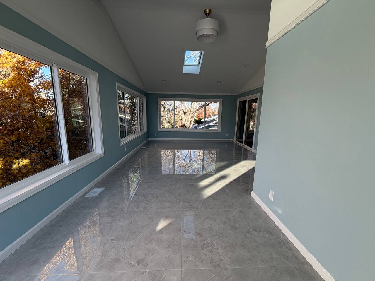 Sunroom enclosure and deck in Colorado